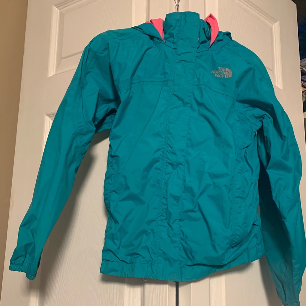 Girls teal northface jacket with hot pink lining.